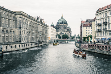 The Spree with ships and the Berlin Cathedral on the Museumsinsel in Berlin, Germany © SN-Photography