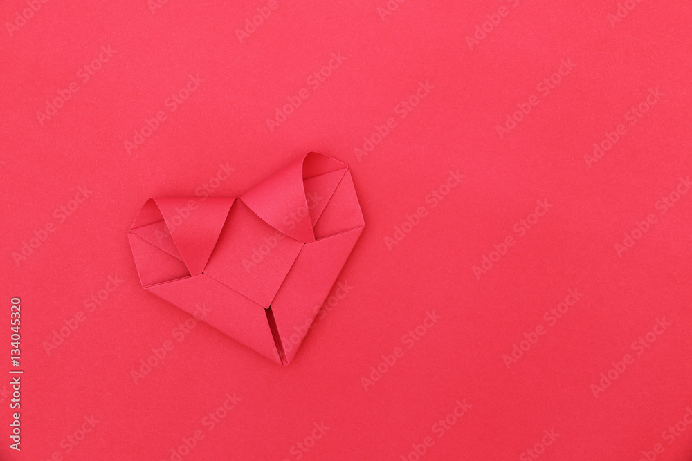 Poster one folding red paper heart on red for pattern and background