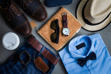 Men's fashion, casual outfits with accessories, flat lay, top view on gray grunge background