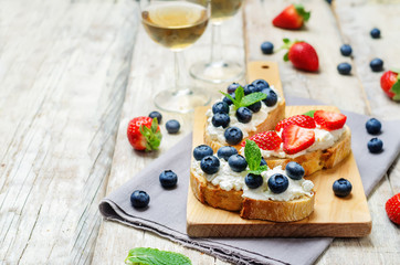 Strawberry and blueberry ricotta sandwiches