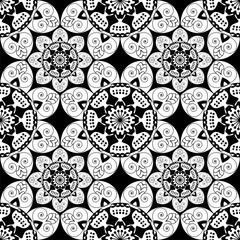 Seamless pattern with mandalas in black and white colors. Vector background.