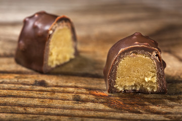 One chocolate candy cut in half