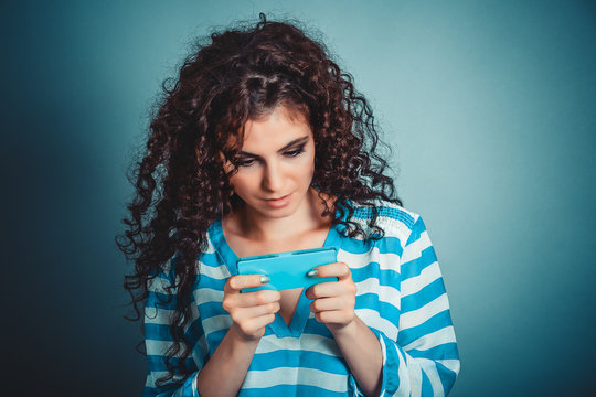 Serious woman texting