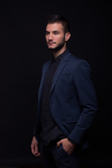 young man sexy looking sideways suit jacket elegant
