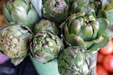 Fresh artichokes for sale at farmer's market.