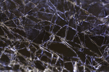 Close up image of a shattered smartphone screen