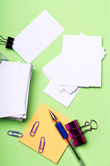 stationery for office: blanks, paper clips, pen, binder clips, stickers
