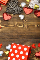 present package and heart on wood as valentines decoration