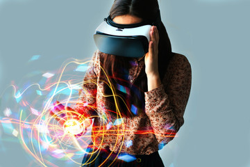 Woman with glasses of virtual reality. Future technology concept.