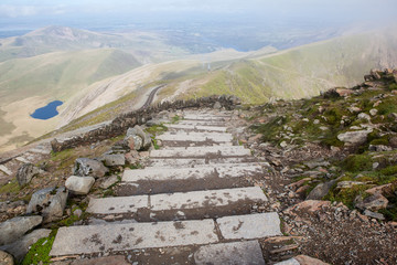 Snowdonia National Park, North Wales, United Kingdom; steps to the top, view of the mountains and...