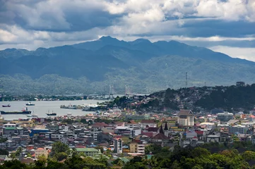 Photo sur Plexiglas Indonésie Ambon City, Indonesia. Ambon City on Ambon Island boasts excellent transport connections and facilities and make it a gateway to Maluku, and its colonial forts, green hills and pleasant beaches.