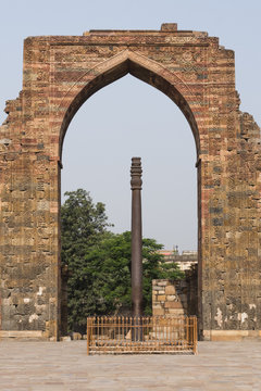Iron pillar inside Qutub complex in Mehrauli, Delhi, India, Asia.