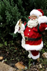 Santa Claus reading Christmas Ornament decoration