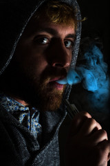 Vaping Bearded Man
