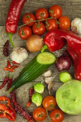 Fresh vegetables on an old wooden table. Preparing vegetarian food. Diet Food. Sales of vegetables.