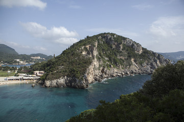 Obraz premium Beautiful view from the hill on a island and blue see in greece