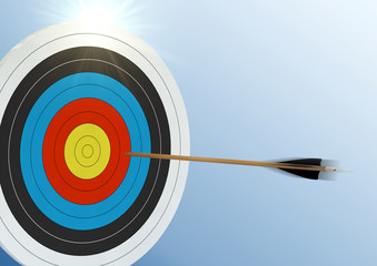 Pfeil fliegt in das Zentrum einer Zielscheibe