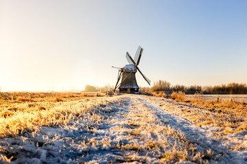 Windmill near Sande at cold winter morning - obrazy, fototapety, plakaty