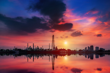 Naklejka premium Oil refinery industry plant along twilight morning , Oil refiner