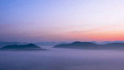 Fototapeta premium Soft focus sunrise at mist on the mountain