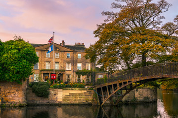 Naklejka premium Walton Hall in a scenic setting of rolling parkland with its own