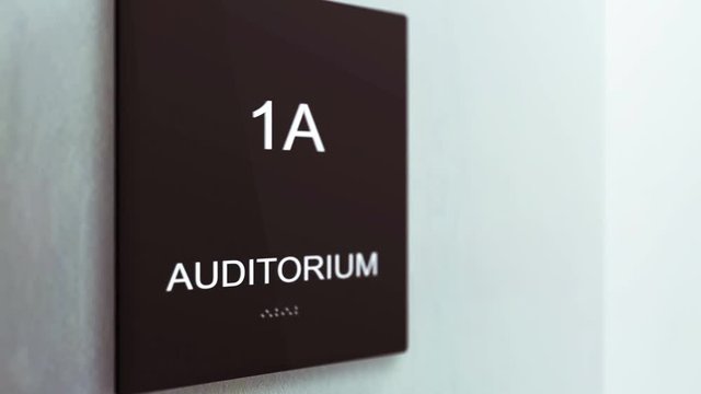 AuditoriumCorporate Sign in an ambient modern Office setting