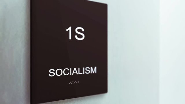 Socialism Corporate Sign in an ambient modern Office setting