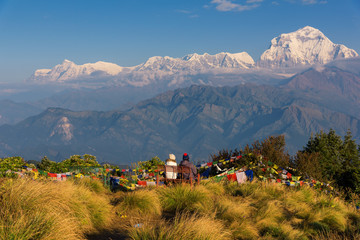 Couple watching the Mt. Dhaulagiri (8,172m) from Poonhill, Nepal.