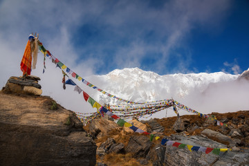 Annapurna I (8,091m) with prayer flag from Annapurna base camp ,Nepal.