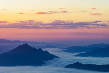 Fototapeta na wymiar Sunrise at Phu chee dao peak of mountain in Chiang rai,Thailand