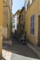 Fototapeta na wymiar La Ciotat narrow street shadow sun historic town.