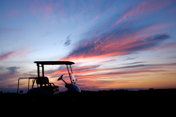 silhouette golf cart in golf course withcolorful twilight sky soft cloud for background backdrop use - 134077717