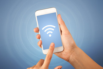 Female hand holding smartphone