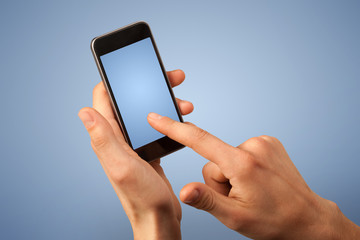 Female hand holding smartphone