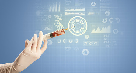 Female doctor holding syringe