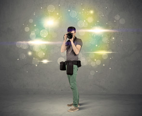 Photographer with flashing lights