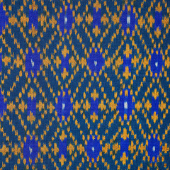 colorful thai silk handcraft peruvian style rug surface old vintage torn conservation Made from natural materials Chemical free close up silk background silk texture