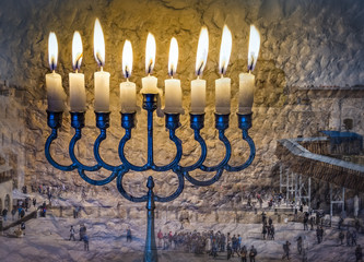 Composite image of menorah with glittering candles and western wall in Jerusalem. The image symbolizes Hanukkah Holiday and Jewish desires and hopes. Selective focus. Toned for retro style  