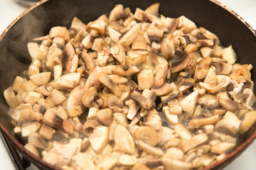 mushrooms fried in a pan