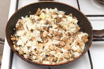 mushrooms fried in a pan
