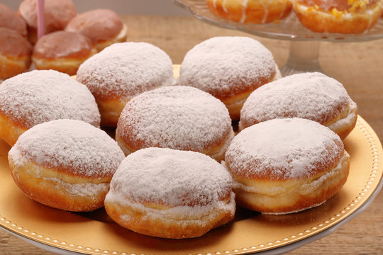 Traditional Polish donuts with liqueur and sugar