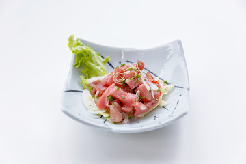 Raw Maguro (Bluefin Tuna) Spicy Salad in Japanese Painted Ceramic Dish.