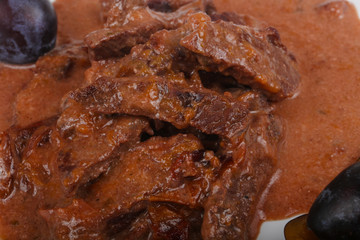 Goulash with plums and thyme
