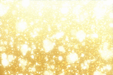 Golden round bokeh or glitter lights festive gold background. Christmas abstract template