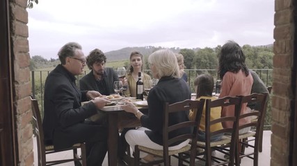 Family dining outdoors