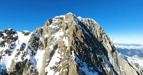 Scenic View Of Rocky Mountains Covered In Snow 4K