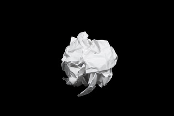 Crumpled paper ball isolated on black with clipping path