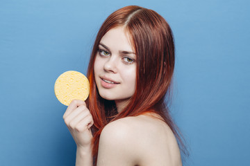 Girl with a sponge, blue background