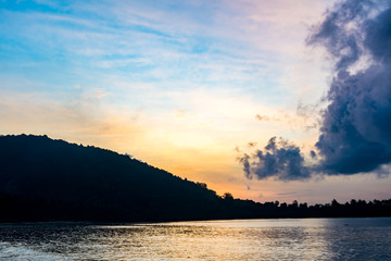 silhouette of the mountains and the sea