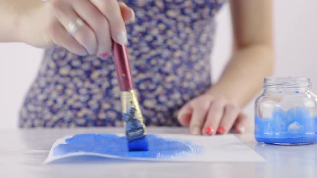 Painting whole paper with turquoise color 4K
